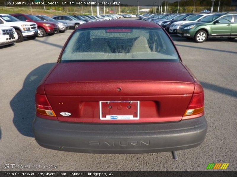 Brilliant Red Metallic / Black/Gray 1998 Saturn S Series SL1 Sedan