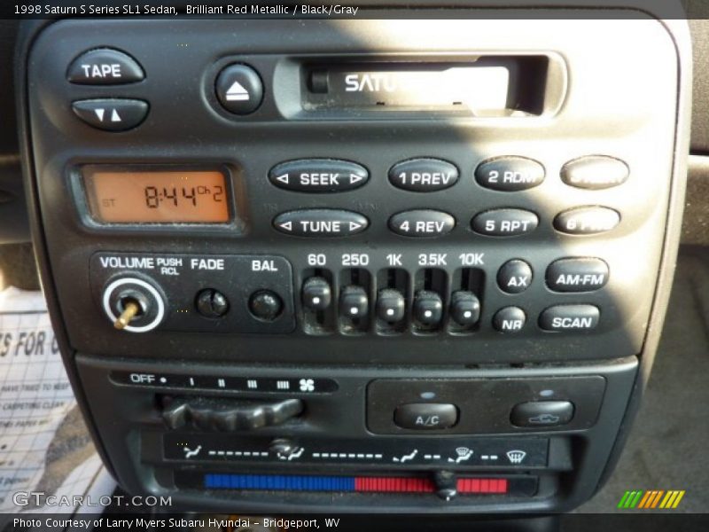 Brilliant Red Metallic / Black/Gray 1998 Saturn S Series SL1 Sedan