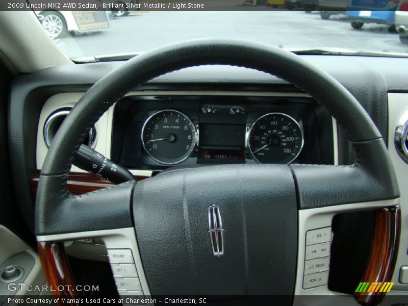Brilliant Silver Metallic / Light Stone 2009 Lincoln MKZ AWD Sedan