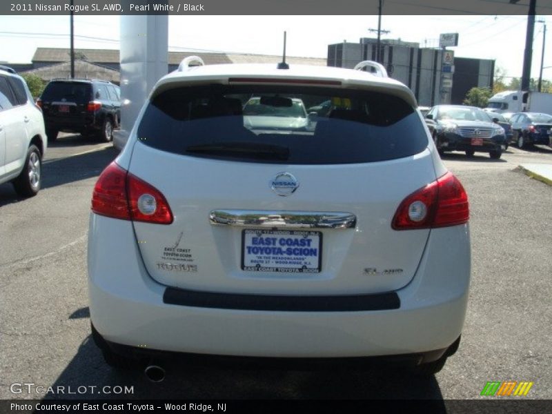 Pearl White / Black 2011 Nissan Rogue SL AWD