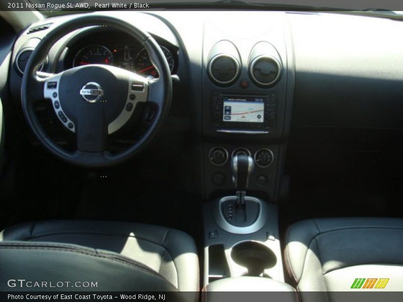 Pearl White / Black 2011 Nissan Rogue SL AWD
