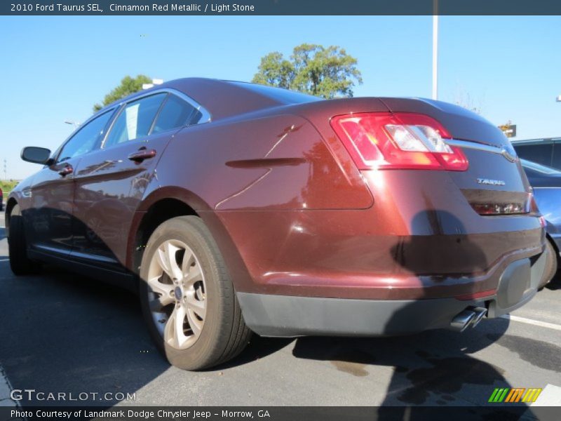 Cinnamon Red Metallic / Light Stone 2010 Ford Taurus SEL