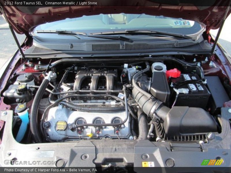 Cinnamon Metallic / Light Stone 2012 Ford Taurus SEL