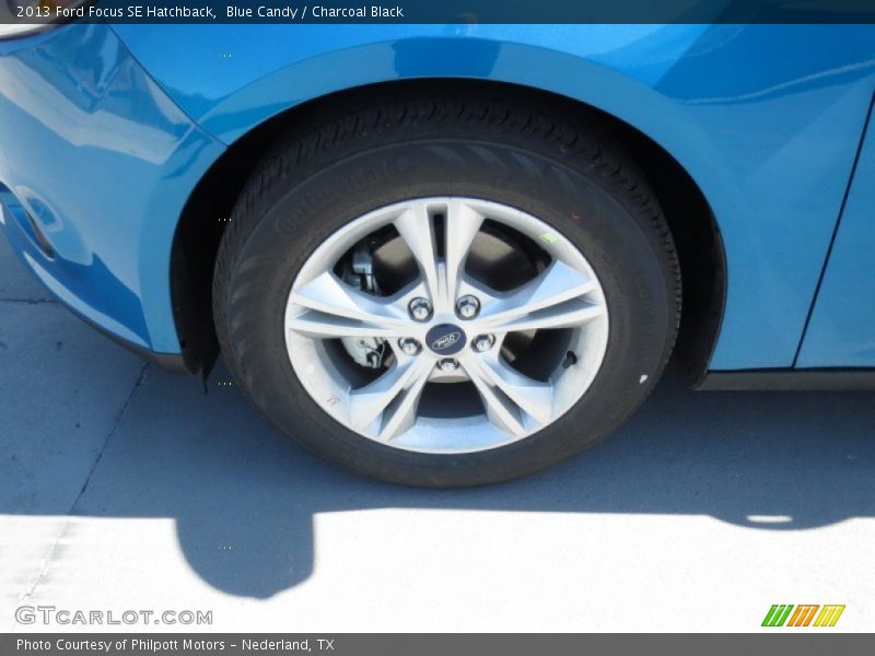 Blue Candy / Charcoal Black 2013 Ford Focus SE Hatchback