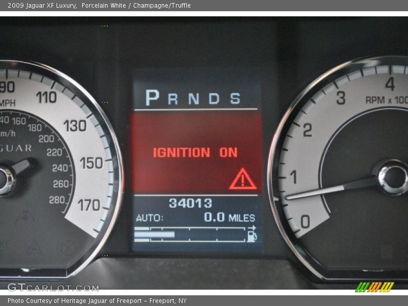 Porcelain White / Champagne/Truffle 2009 Jaguar XF Luxury