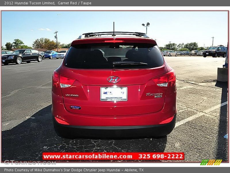 Garnet Red / Taupe 2012 Hyundai Tucson Limited