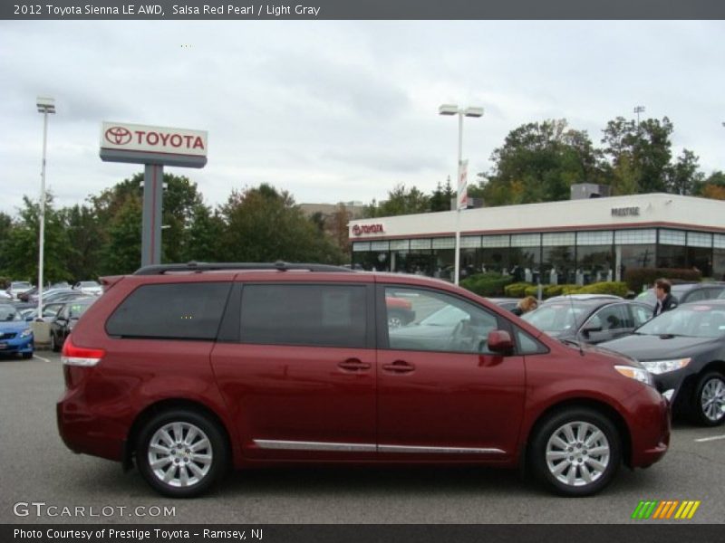 Salsa Red Pearl / Light Gray 2012 Toyota Sienna LE AWD