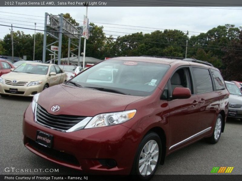 Salsa Red Pearl / Light Gray 2012 Toyota Sienna LE AWD