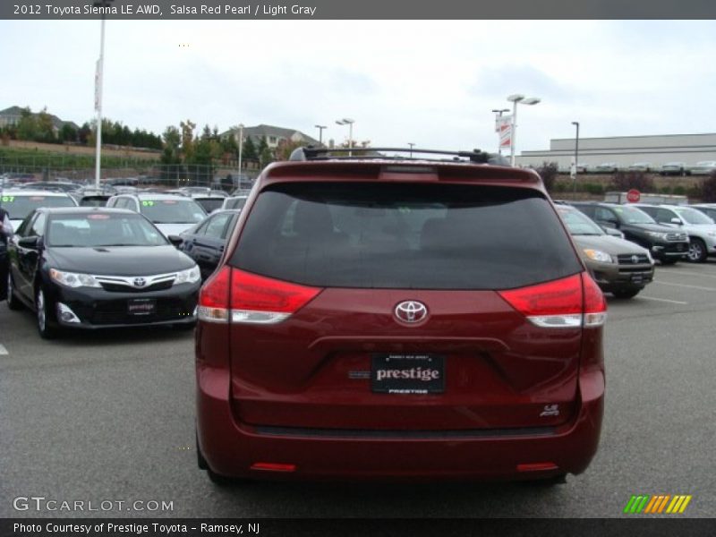 Salsa Red Pearl / Light Gray 2012 Toyota Sienna LE AWD