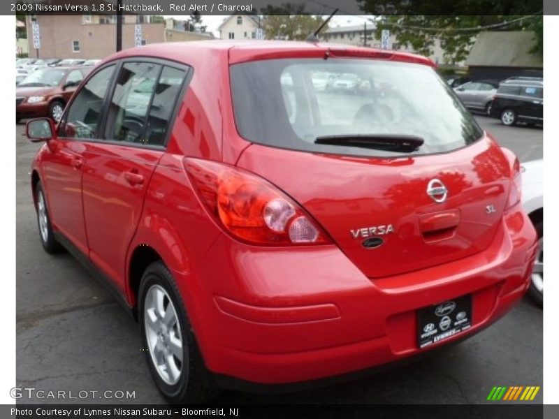 Red Alert / Charcoal 2009 Nissan Versa 1.8 SL Hatchback