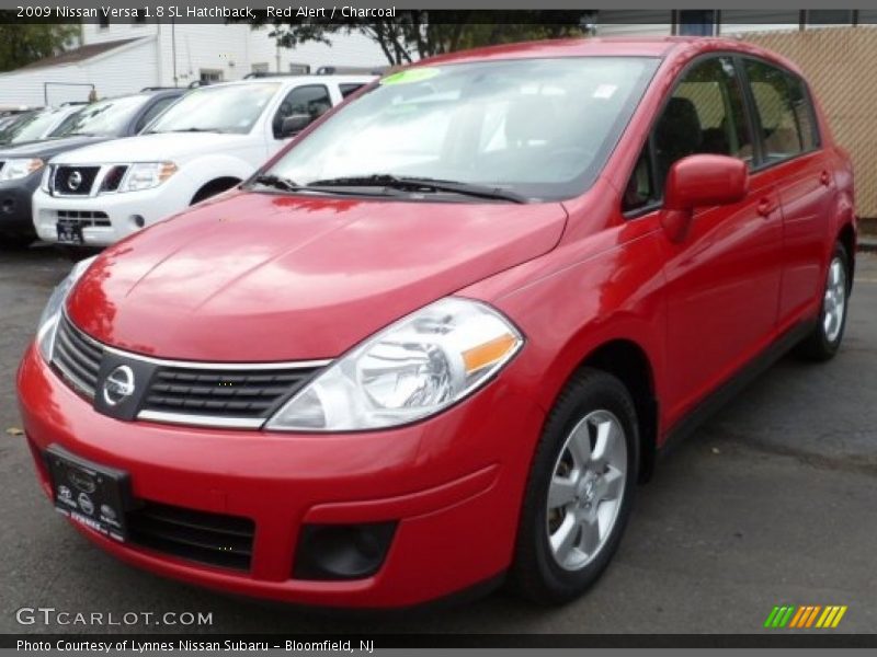 Red Alert / Charcoal 2009 Nissan Versa 1.8 SL Hatchback