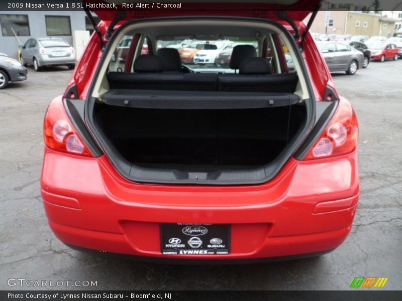 Red Alert / Charcoal 2009 Nissan Versa 1.8 SL Hatchback