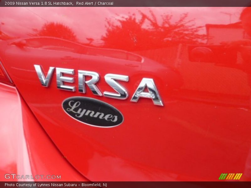 Red Alert / Charcoal 2009 Nissan Versa 1.8 SL Hatchback