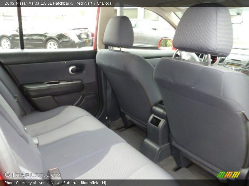 Red Alert / Charcoal 2009 Nissan Versa 1.8 SL Hatchback