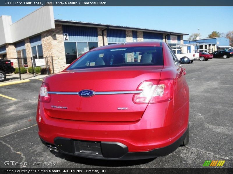 Red Candy Metallic / Charcoal Black 2010 Ford Taurus SEL