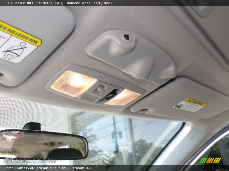 Diamond White Pearl / Black 2010 Mitsubishi Outlander SE 4WD