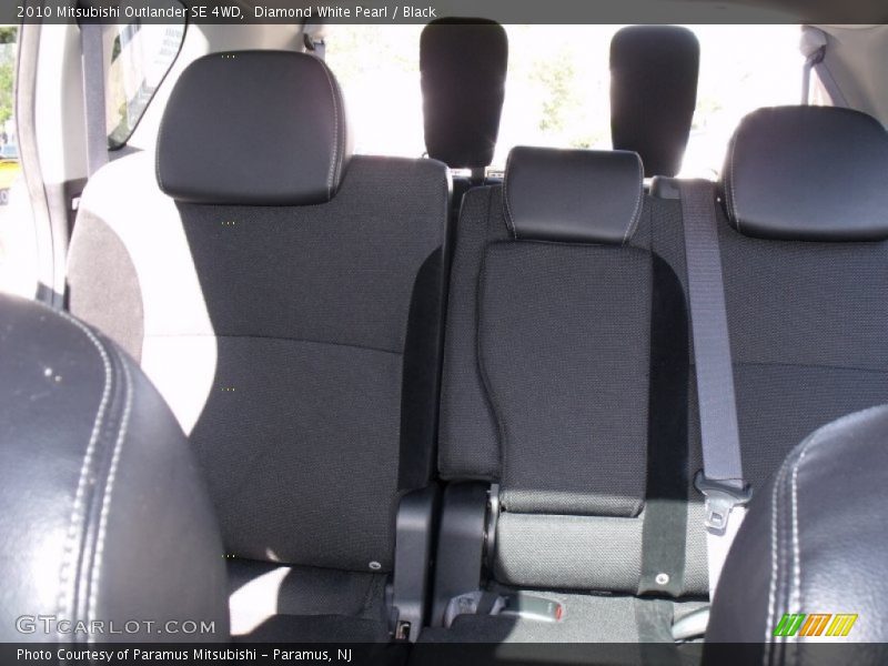 Diamond White Pearl / Black 2010 Mitsubishi Outlander SE 4WD