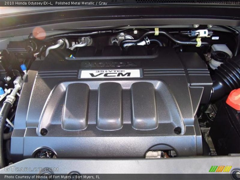 Polished Metal Metallic / Gray 2010 Honda Odyssey EX-L