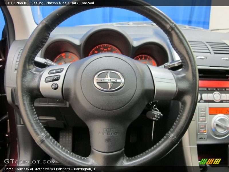Sizzling Crimson Mica / Dark Charcoal 2010 Scion tC