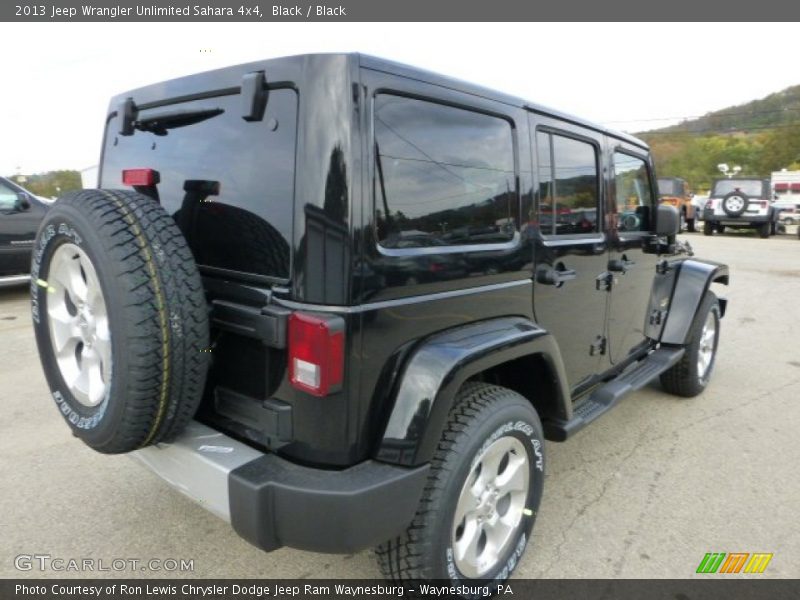Black / Black 2013 Jeep Wrangler Unlimited Sahara 4x4