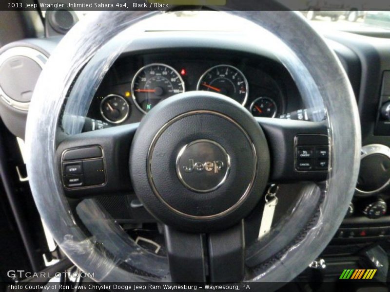 Black / Black 2013 Jeep Wrangler Unlimited Sahara 4x4