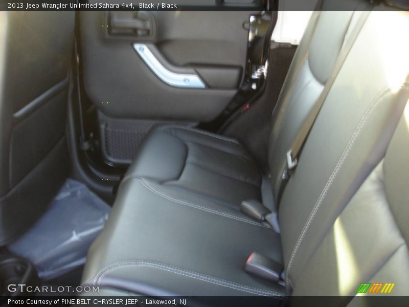 Black / Black 2013 Jeep Wrangler Unlimited Sahara 4x4