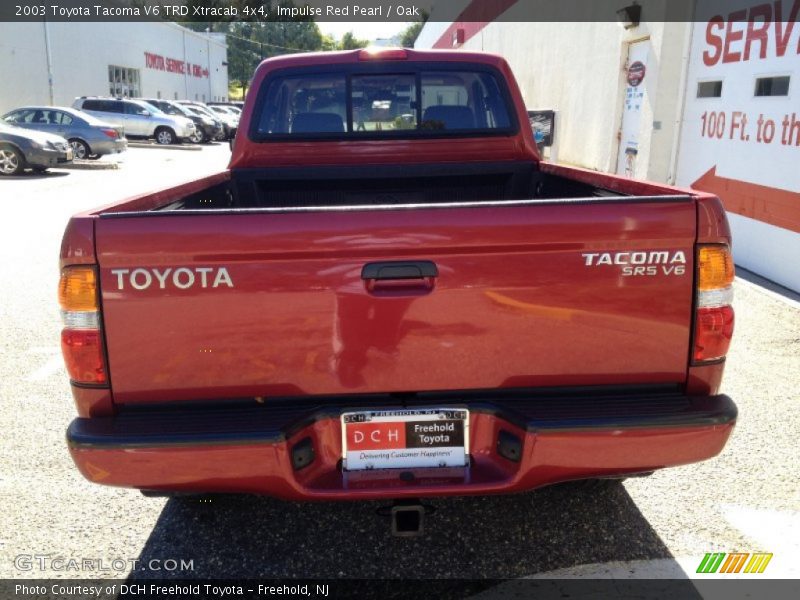 Impulse Red Pearl / Oak 2003 Toyota Tacoma V6 TRD Xtracab 4x4