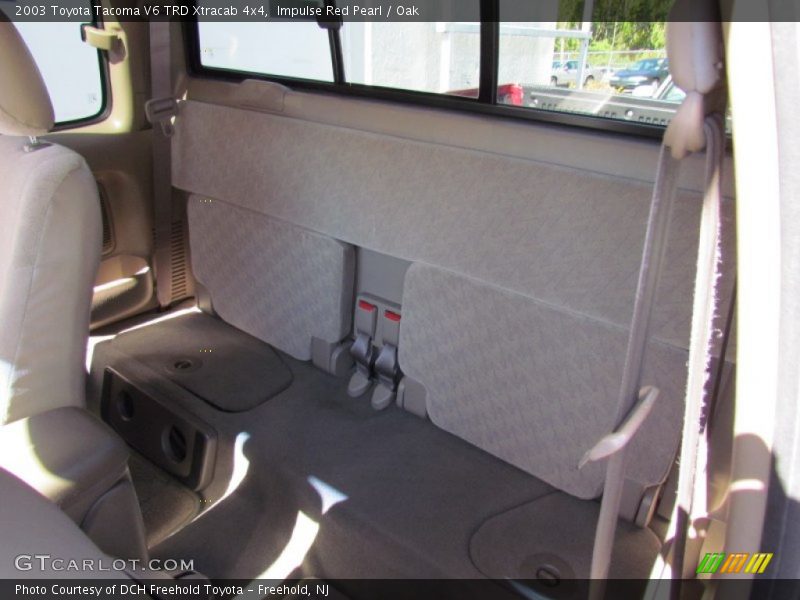 Impulse Red Pearl / Oak 2003 Toyota Tacoma V6 TRD Xtracab 4x4