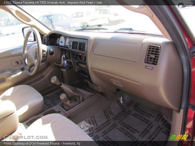Impulse Red Pearl / Oak 2003 Toyota Tacoma V6 TRD Xtracab 4x4