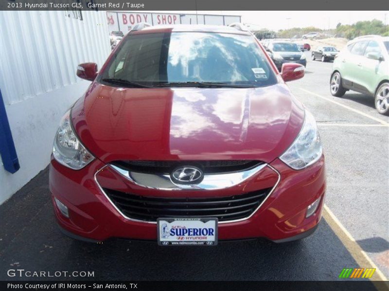 Garnet Red / Taupe 2013 Hyundai Tucson GLS