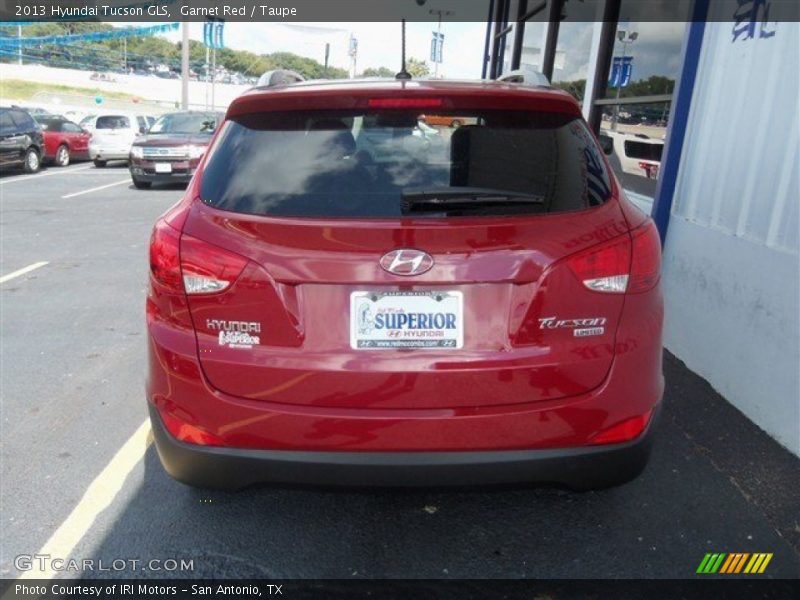 Garnet Red / Taupe 2013 Hyundai Tucson GLS