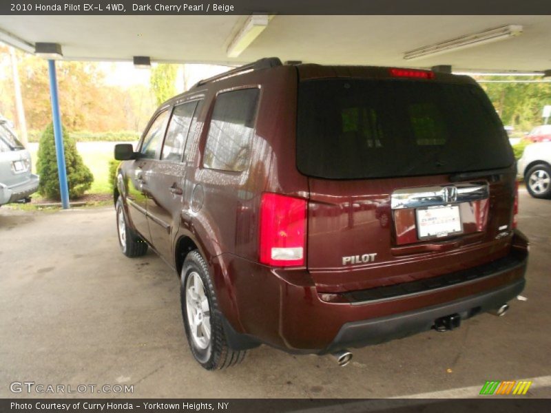 Dark Cherry Pearl / Beige 2010 Honda Pilot EX-L 4WD