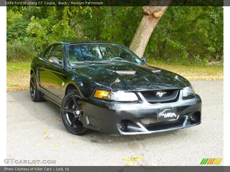 Black / Medium Parchment 1999 Ford Mustang GT Coupe
