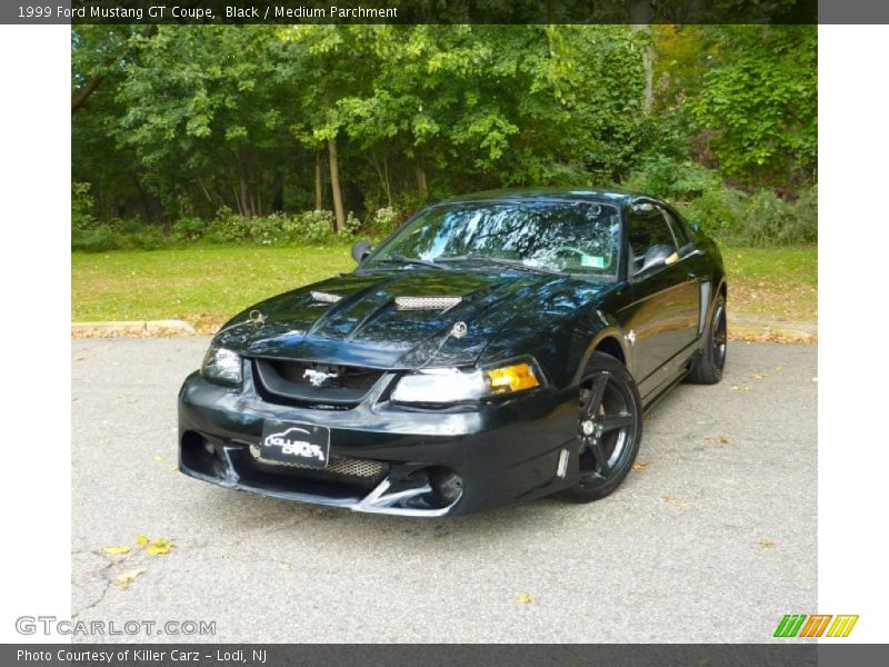 Black / Medium Parchment 1999 Ford Mustang GT Coupe
