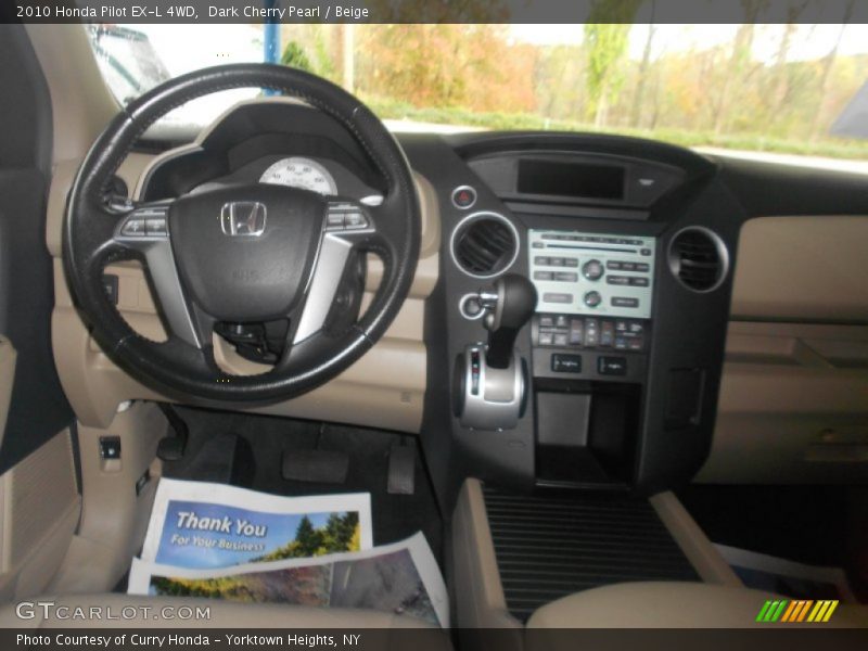 Dark Cherry Pearl / Beige 2010 Honda Pilot EX-L 4WD
