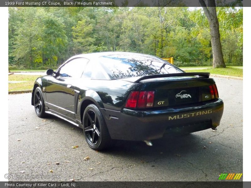 Black / Medium Parchment 1999 Ford Mustang GT Coupe