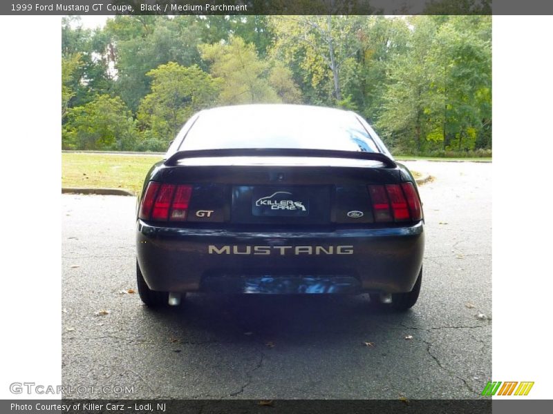 Black / Medium Parchment 1999 Ford Mustang GT Coupe