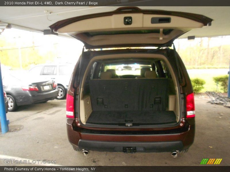 Dark Cherry Pearl / Beige 2010 Honda Pilot EX-L 4WD