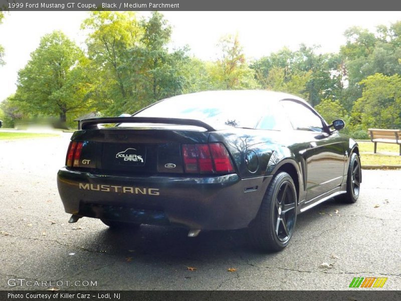 Black / Medium Parchment 1999 Ford Mustang GT Coupe