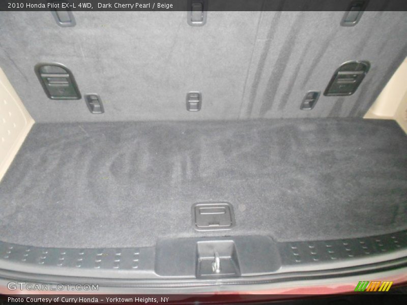 Dark Cherry Pearl / Beige 2010 Honda Pilot EX-L 4WD