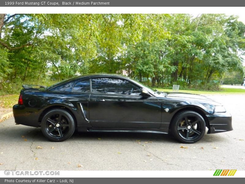 Black / Medium Parchment 1999 Ford Mustang GT Coupe