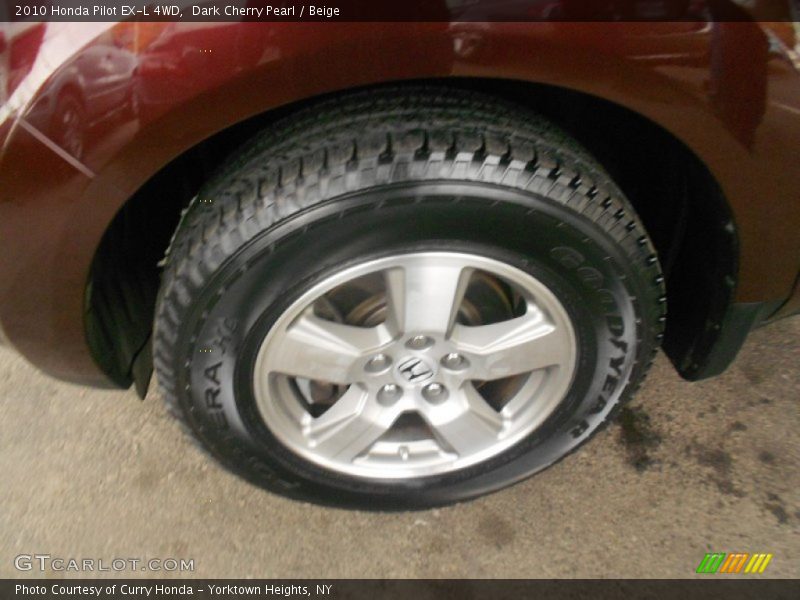 Dark Cherry Pearl / Beige 2010 Honda Pilot EX-L 4WD