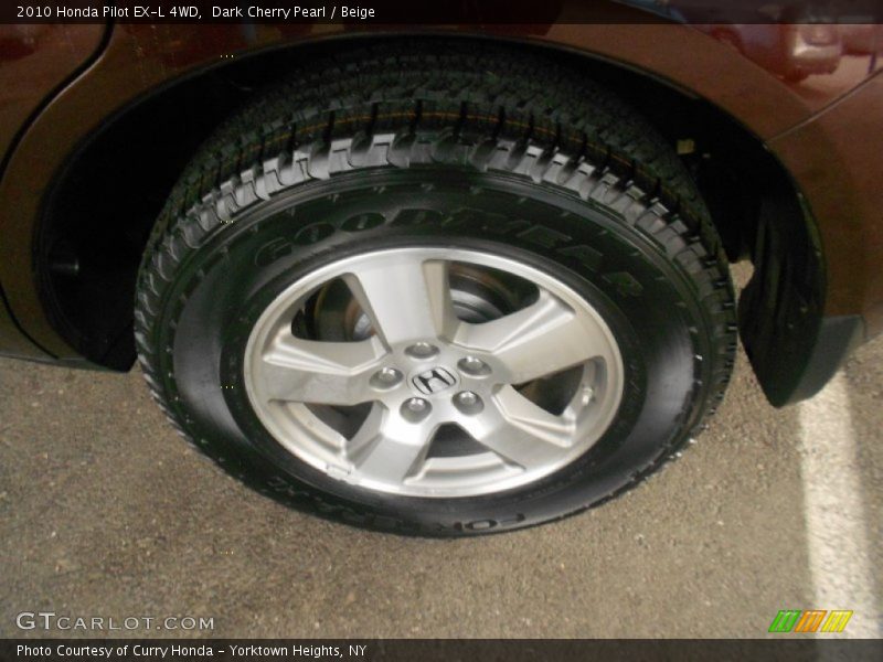 Dark Cherry Pearl / Beige 2010 Honda Pilot EX-L 4WD