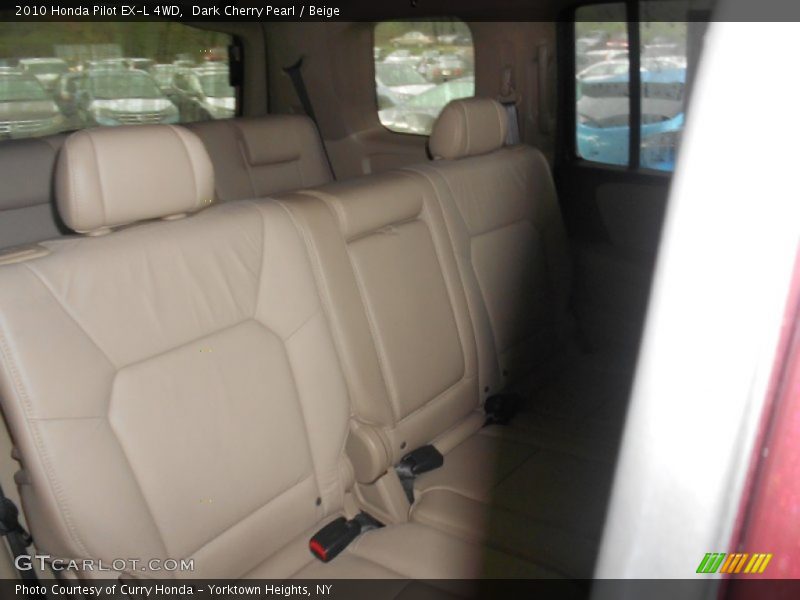 Dark Cherry Pearl / Beige 2010 Honda Pilot EX-L 4WD