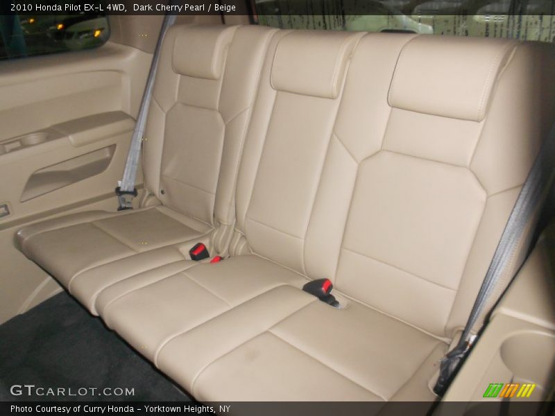 Dark Cherry Pearl / Beige 2010 Honda Pilot EX-L 4WD