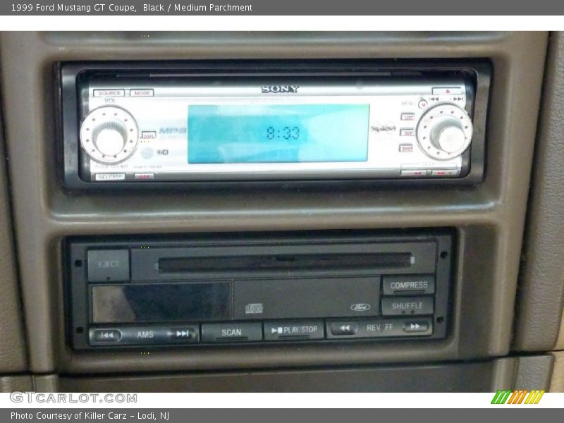 Black / Medium Parchment 1999 Ford Mustang GT Coupe