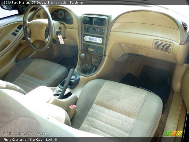 Black / Medium Parchment 1999 Ford Mustang GT Coupe