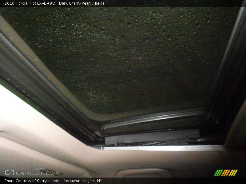 Dark Cherry Pearl / Beige 2010 Honda Pilot EX-L 4WD