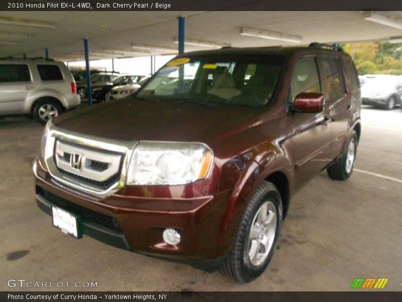Dark Cherry Pearl / Beige 2010 Honda Pilot EX-L 4WD