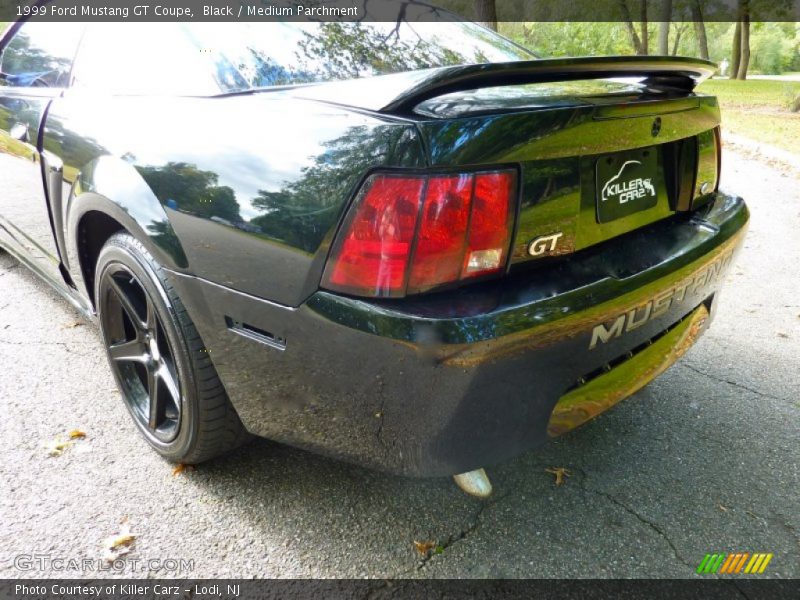 Black / Medium Parchment 1999 Ford Mustang GT Coupe